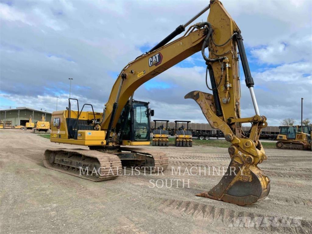 CAT 323 Rupsgraafmachines