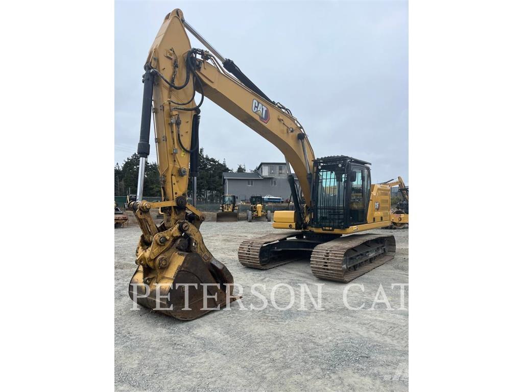 CAT 323 Rupsgraafmachines