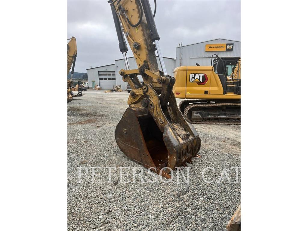 CAT 323 Rupsgraafmachines