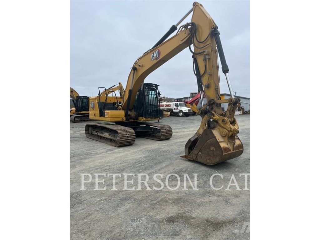 CAT 323 Rupsgraafmachines