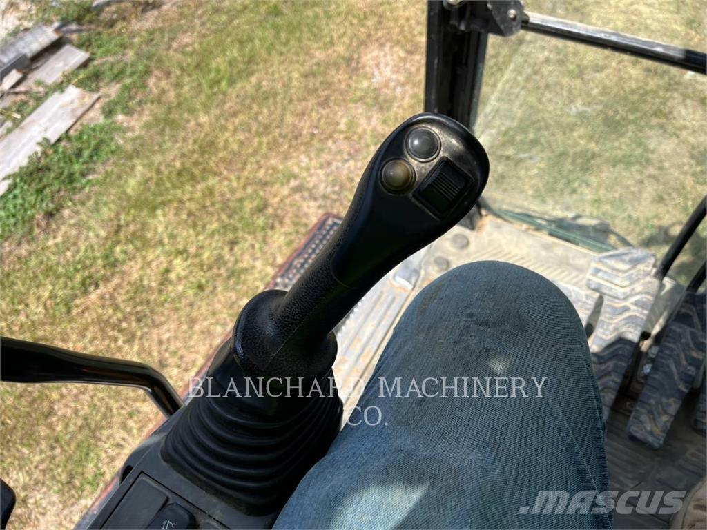 CAT 323 Rupsgraafmachines