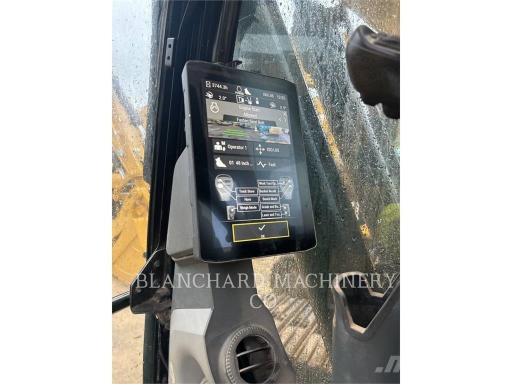 CAT 323 Rupsgraafmachines