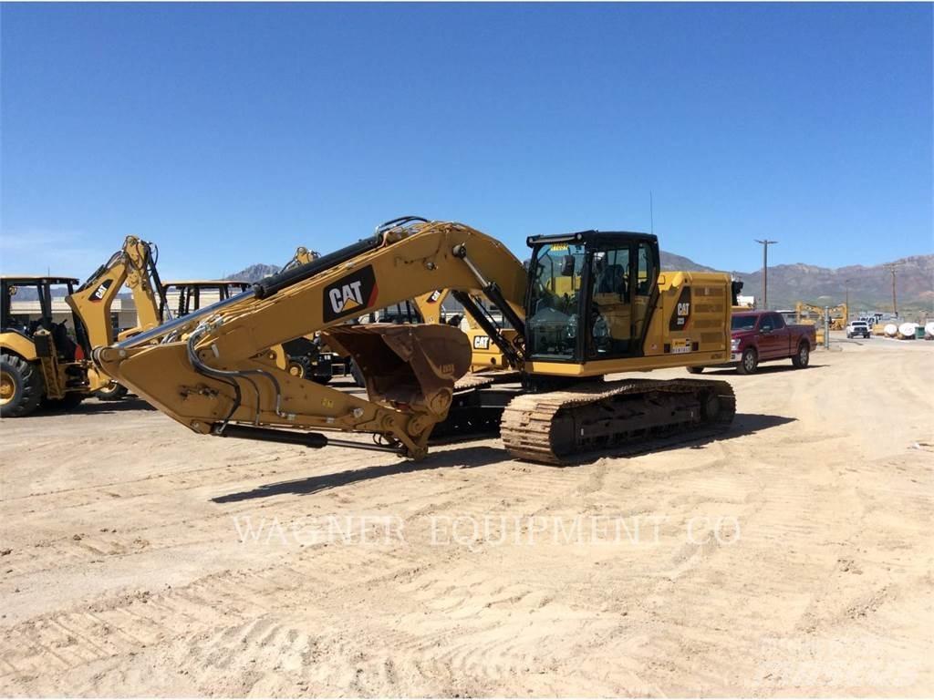 CAT 323 Rupsgraafmachines