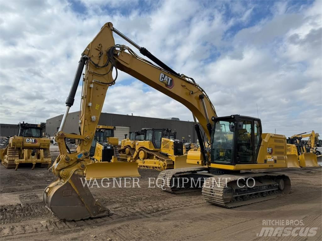 CAT 323 Rupsgraafmachines