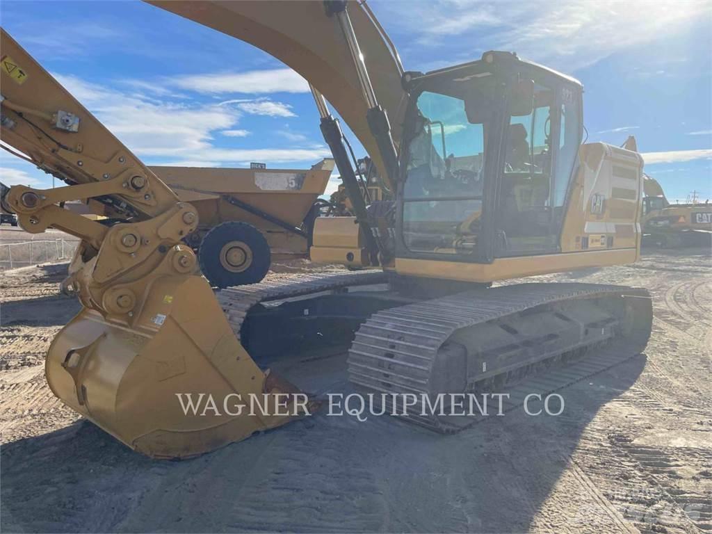 CAT 323 Rupsgraafmachines