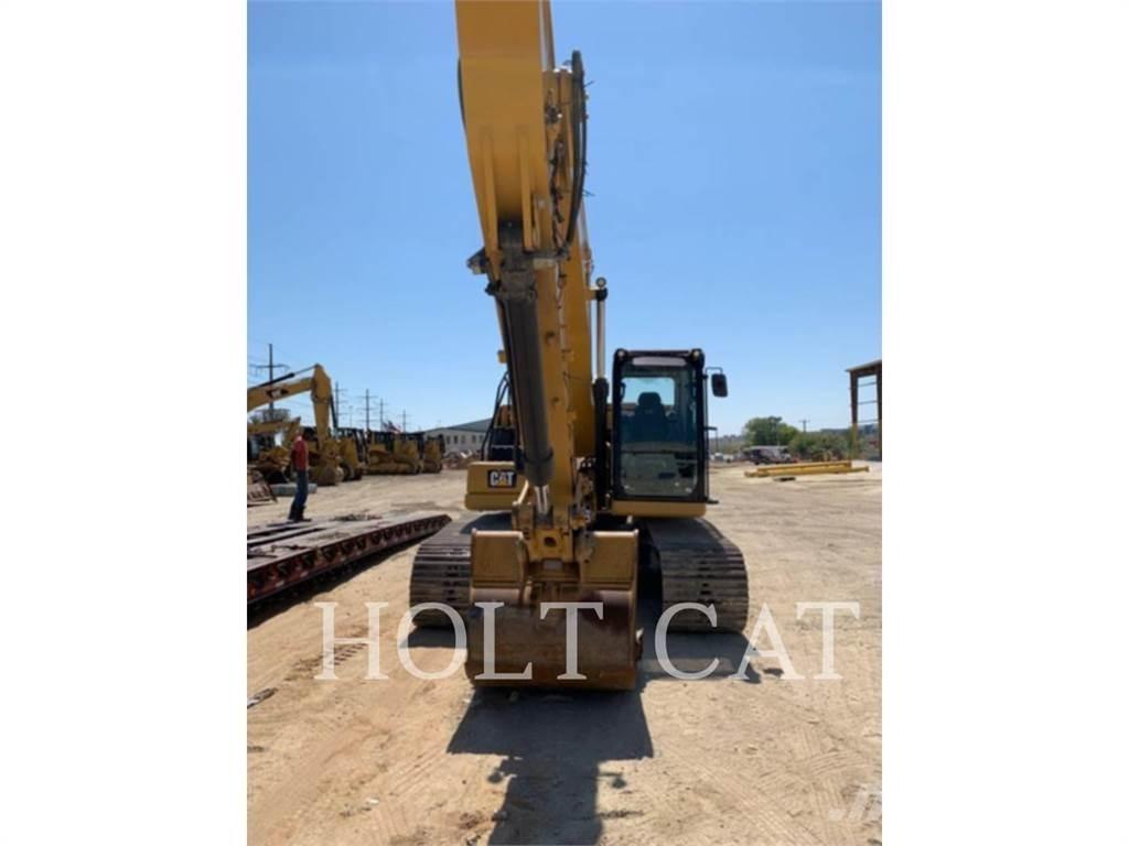 CAT 323 Rupsgraafmachines
