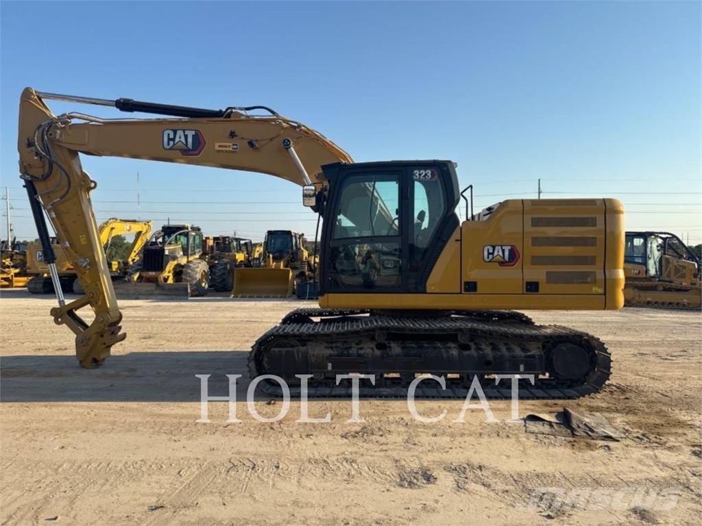 CAT 323 TC Wielladers