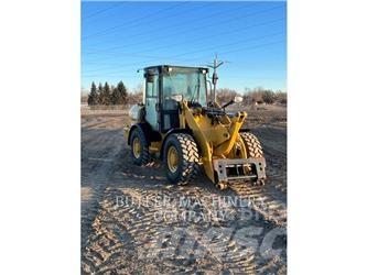 CAT 906M Wielladers