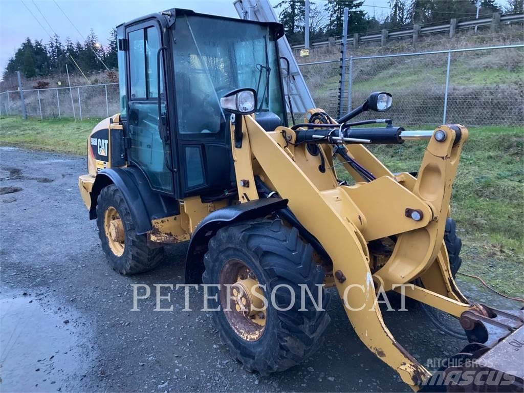 CAT 906M Wielladers