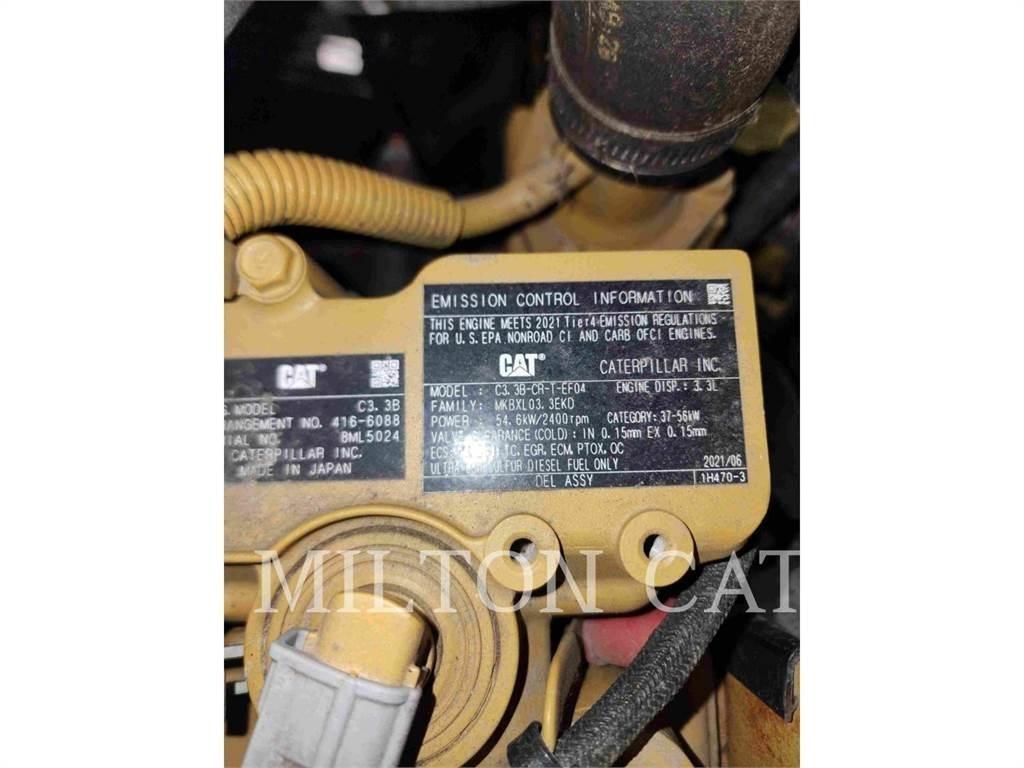 CAT 906M Wielladers