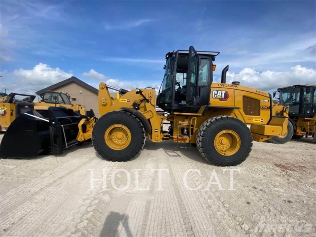CAT 938M QC Wielladers