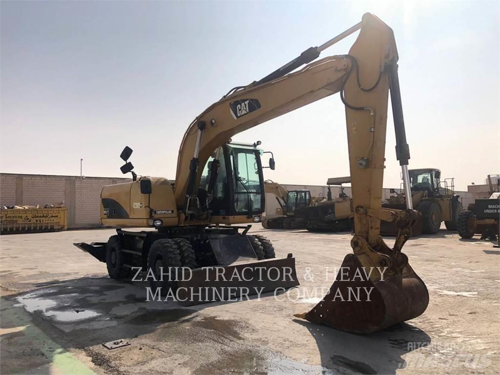 CAT M317D Wielgraafmachines