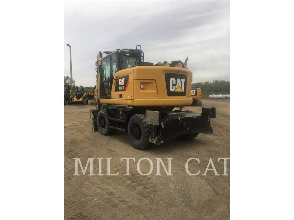 CAT M317F Wielgraafmachines