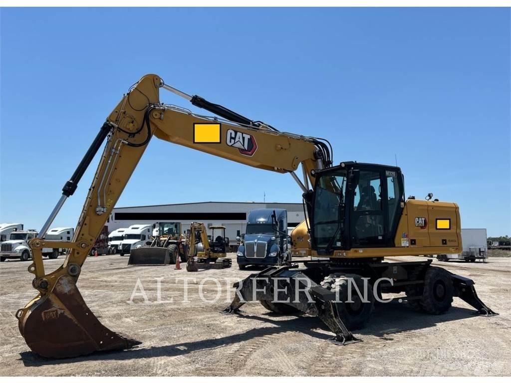 CAT M320 Wielgraafmachines