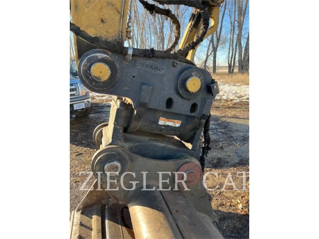 CAT M320F Wielgraafmachines