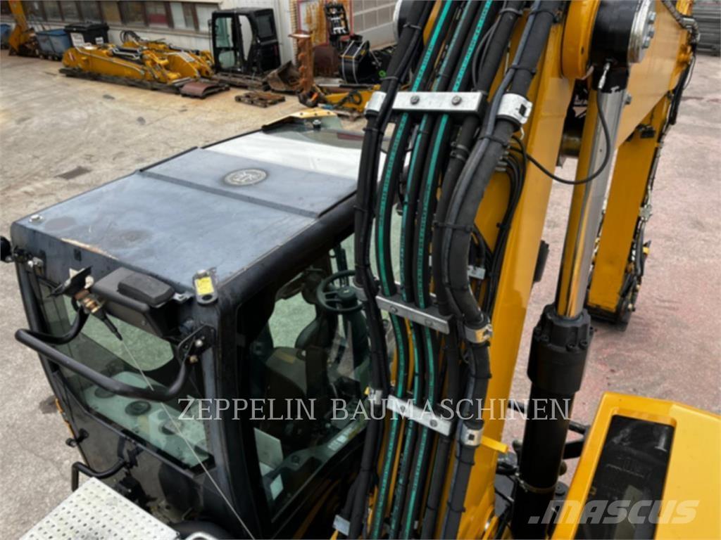 CAT M320F Wielgraafmachines