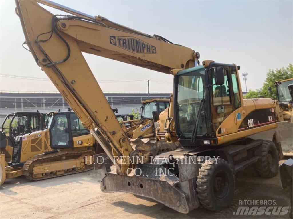 CAT M322C Wielgraafmachines