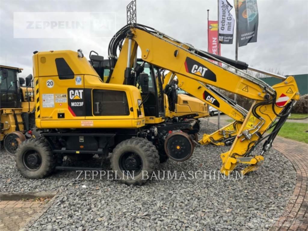 CAT M323F Wielgraafmachines