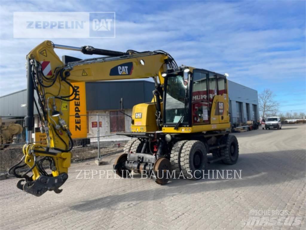 CAT M323F Wielgraafmachines