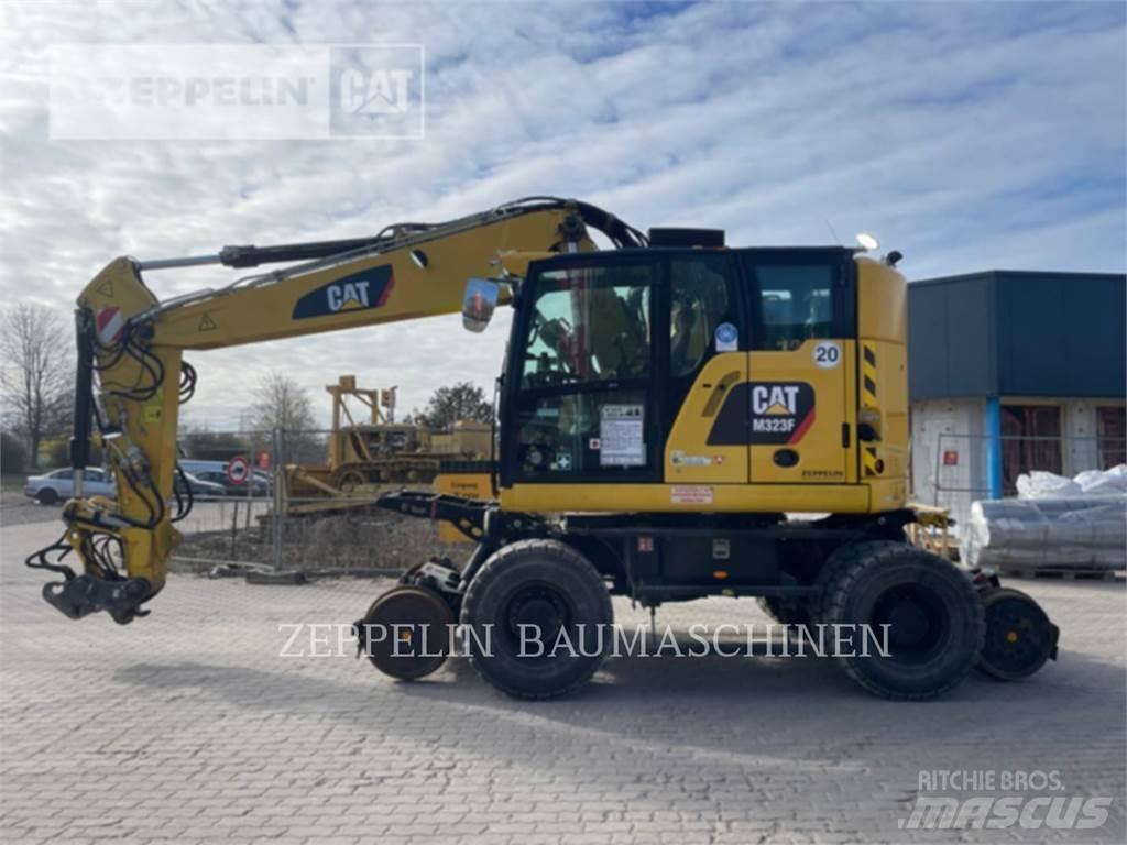 CAT M323F Wielgraafmachines