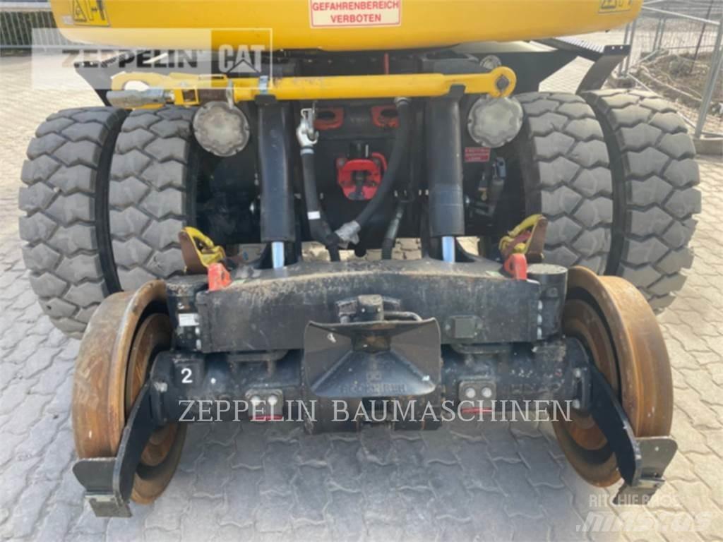 CAT M323F Wielgraafmachines