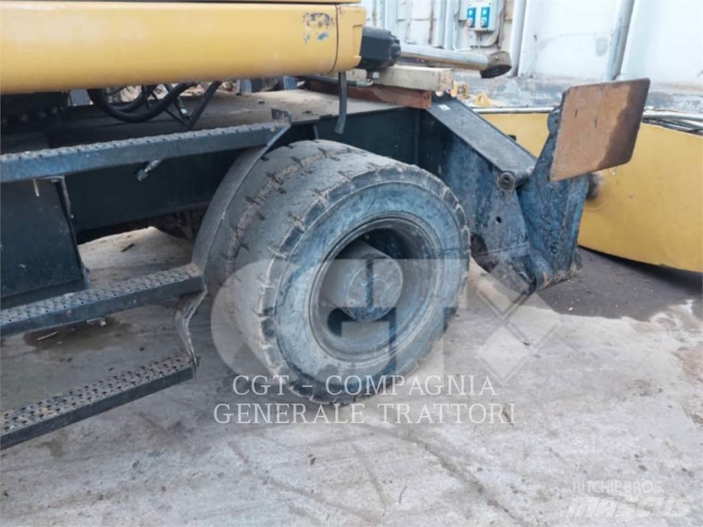 CAT MH3024 Wielgraafmachines