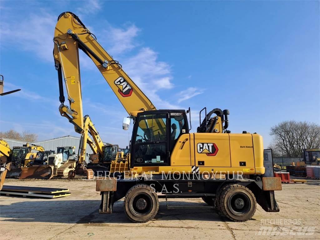 CAT MH3024 Wielgraafmachines