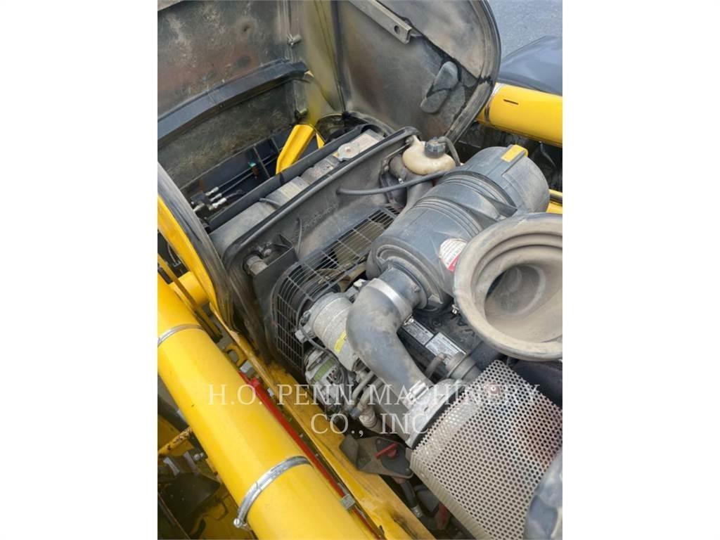 Komatsu WB150 Graaf-laadcombinaties