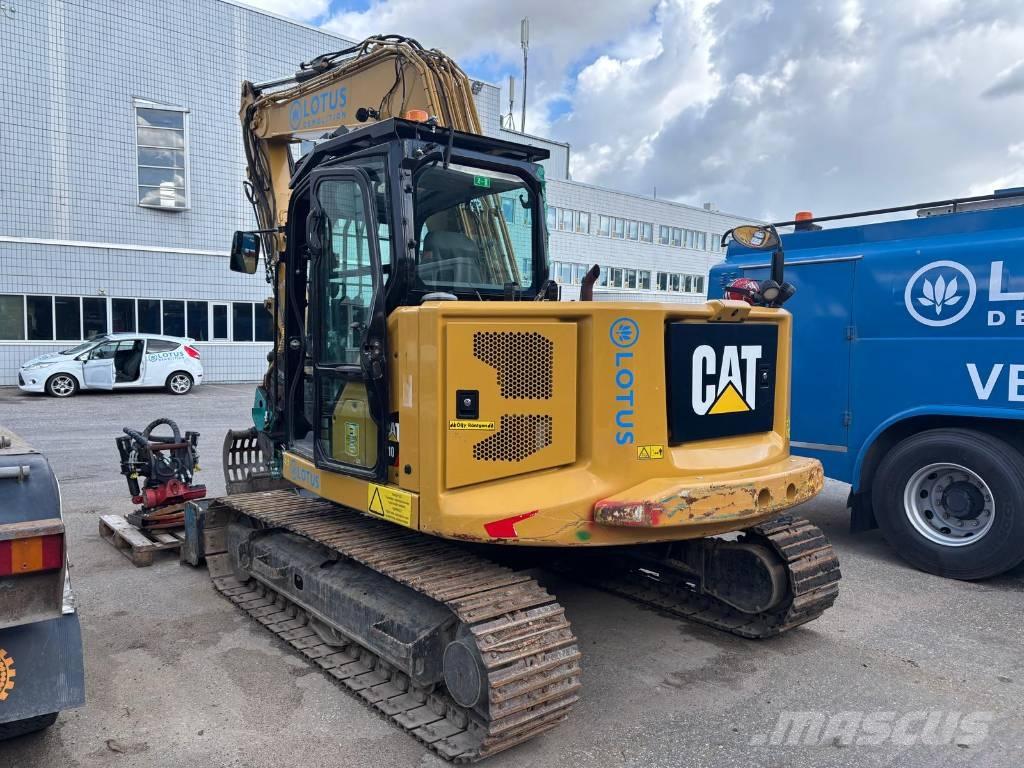 CAT 310 Rupsgraafmachines