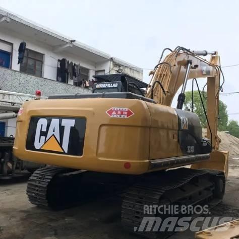 CAT 324 Rupsgraafmachines
