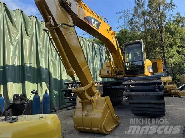 CAT 320 C Amfibische graafmachines