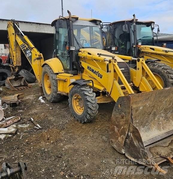 Komatsu WB 93 R Graaf-laadcombinaties