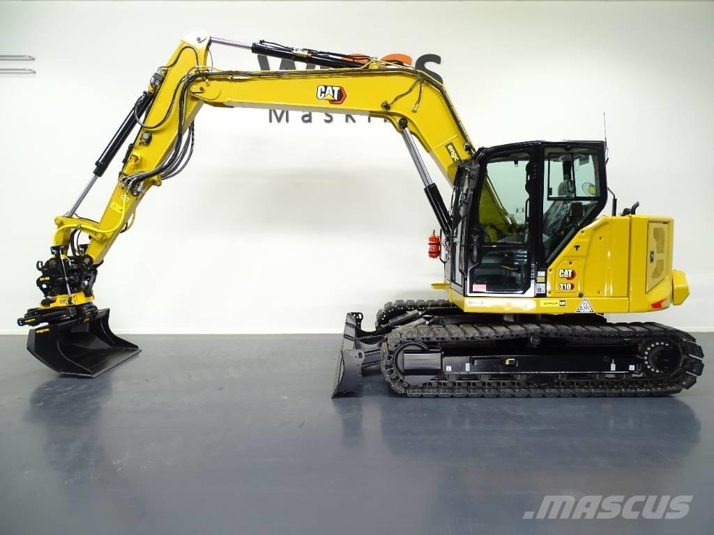 CAT 310 Rupsgraafmachines
