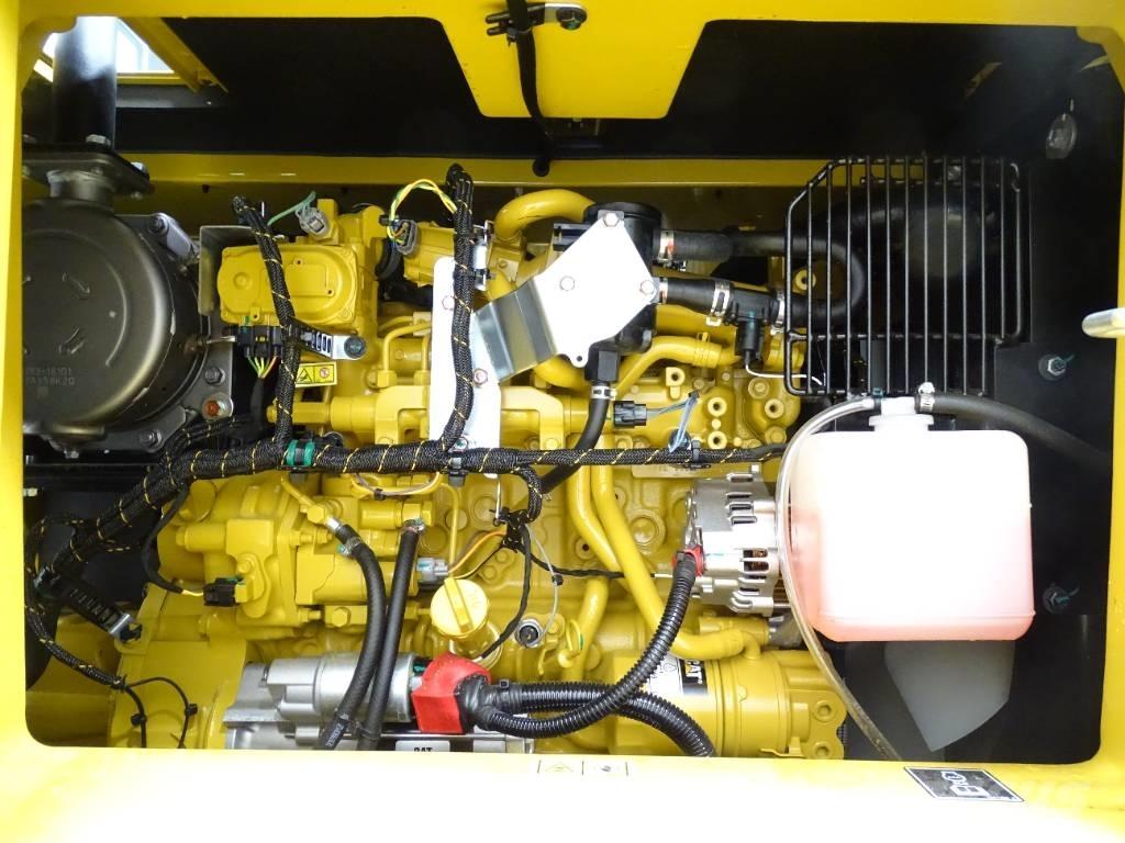 CAT 310 Rupsgraafmachines