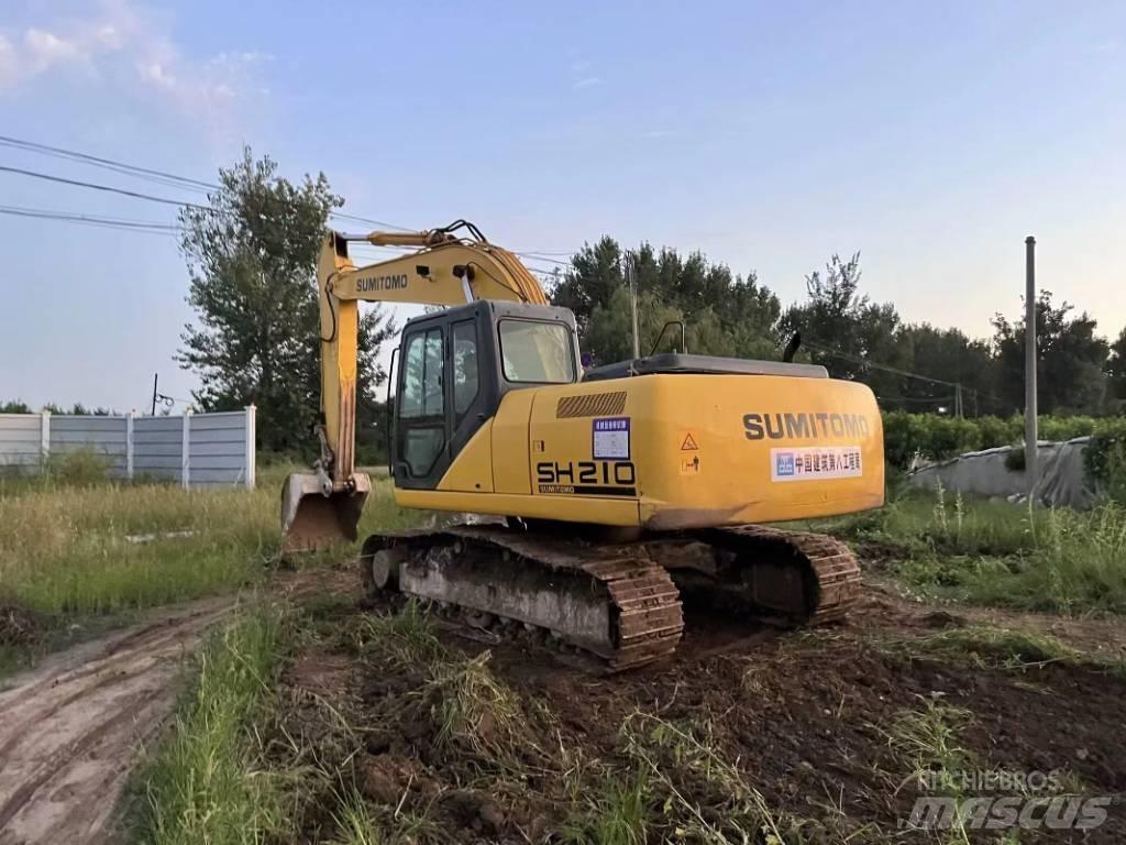 Sumitomo SH210 Rupsgraafmachines