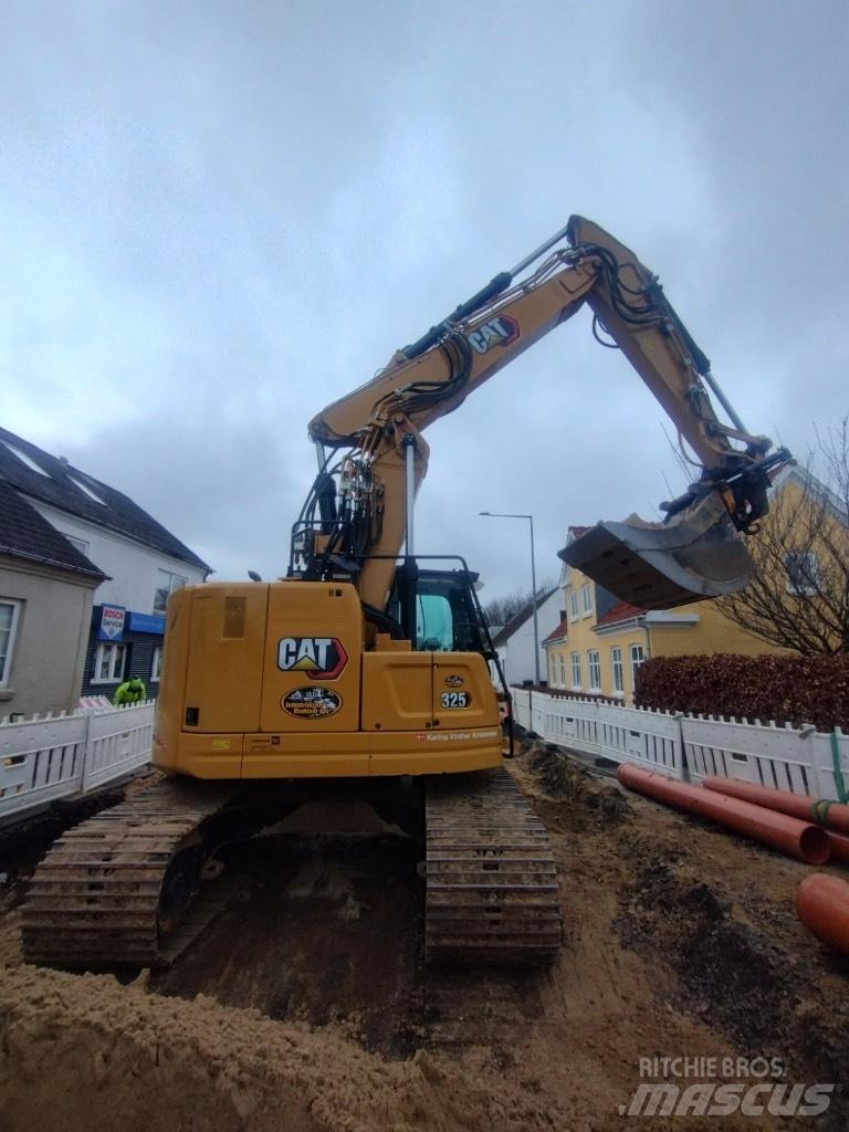 CAT 325 Rupsgraafmachines