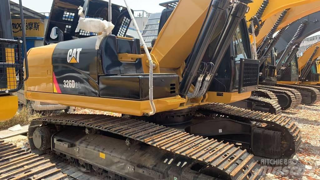 CAT 326 Rupsgraafmachines