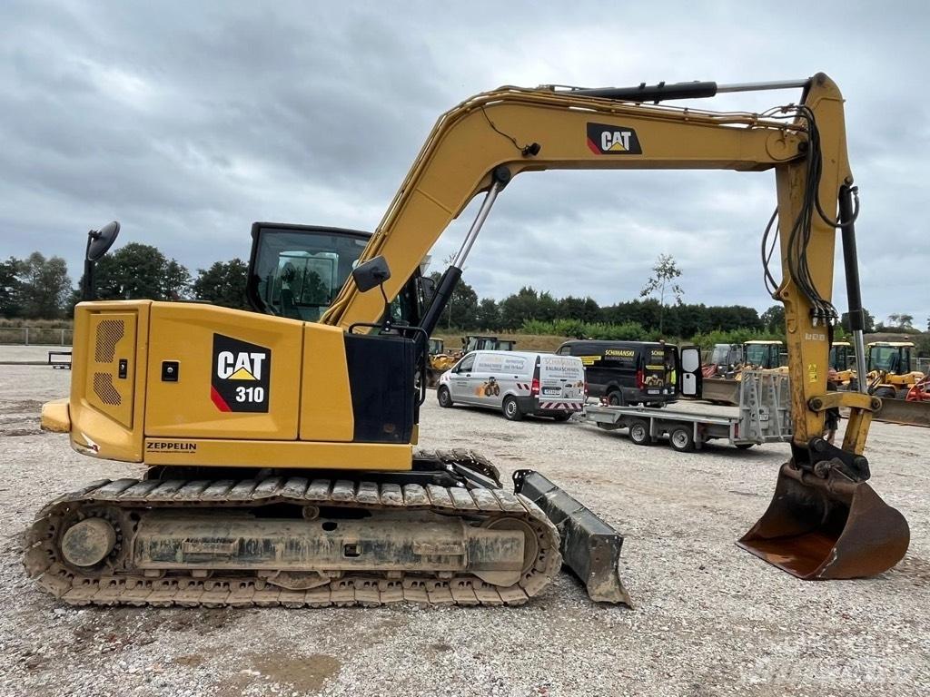 CAT 310 Midigraafmachines 7t - 12t