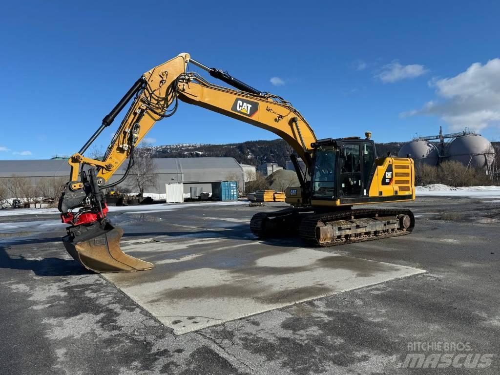 CAT 323 NG Rupsgraafmachines