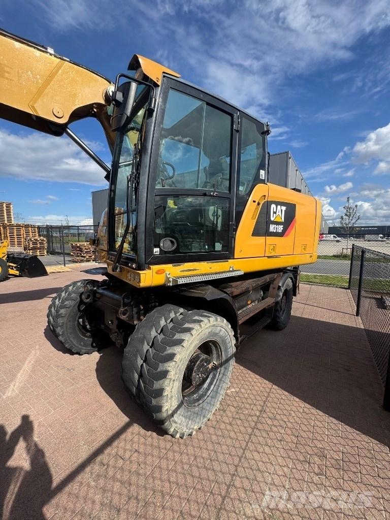 CAT 318 Wielgraafmachines