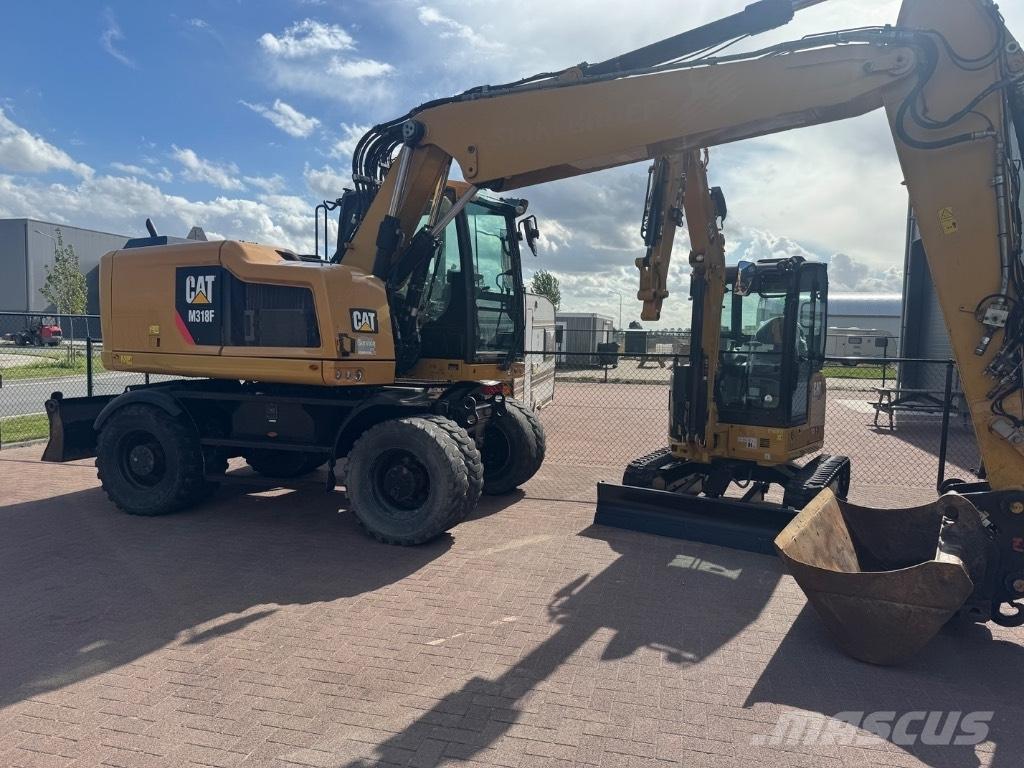 CAT 318 Wielgraafmachines