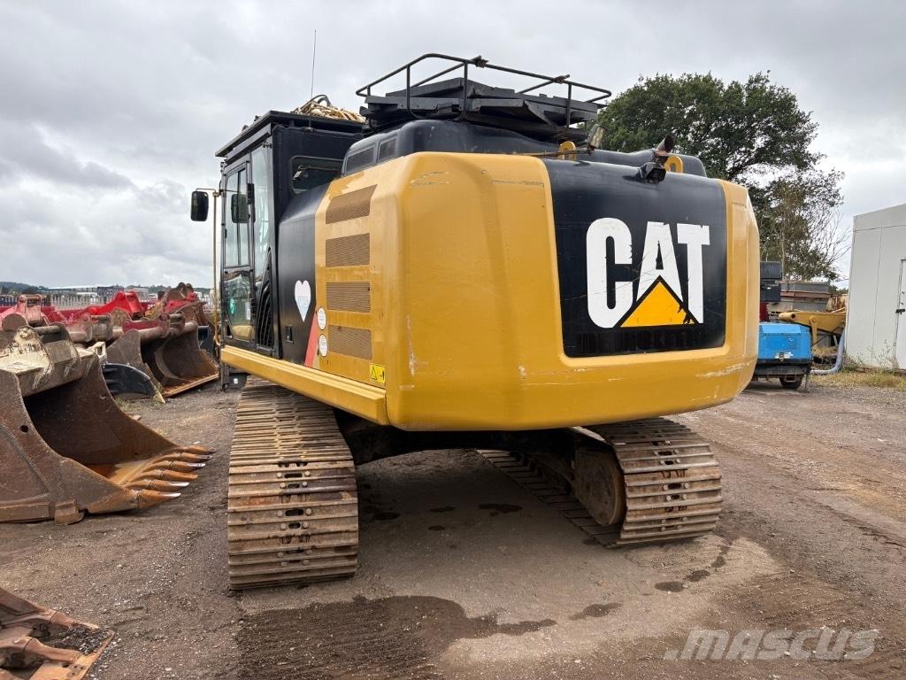 CAT 323 F L Rupsgraafmachines