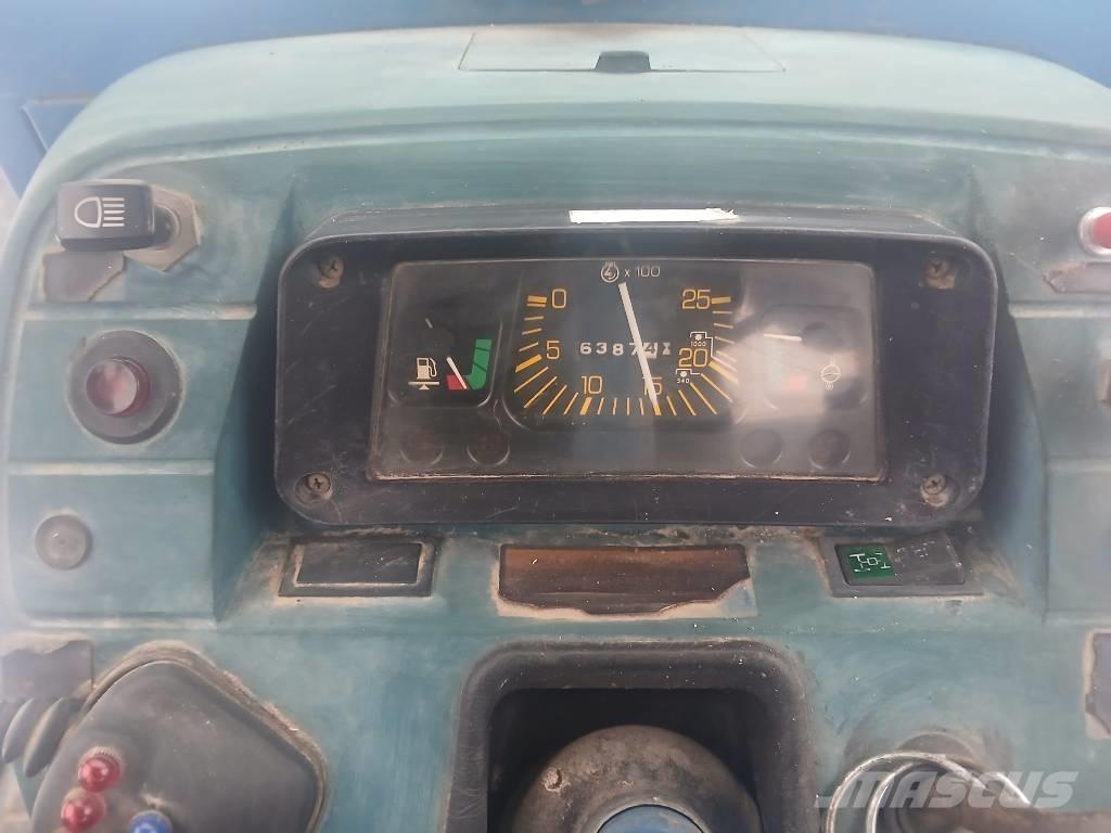 Ford 5610 II Farmall Tractoren