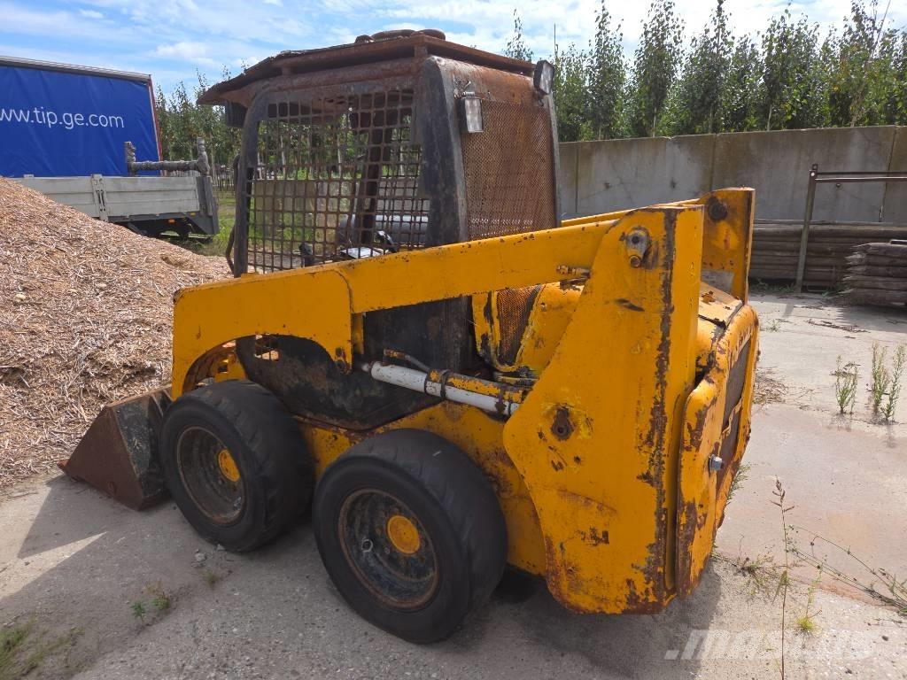 Komatsu SK 714 Schrankladers