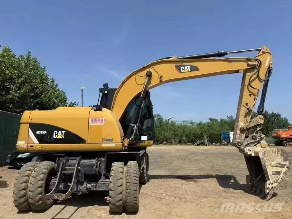 CAT M 315 D Wielgraafmachines