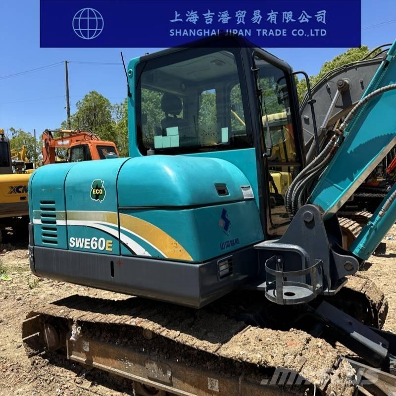 Sunward SWE 60 Rupsgraafmachines