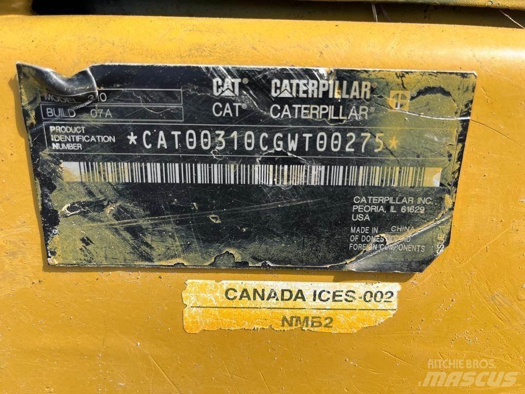 CAT 310 Rupsgraafmachines
