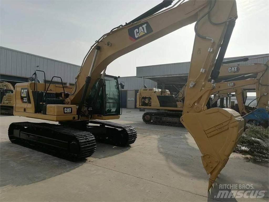 CAT 323 Rupsgraafmachines