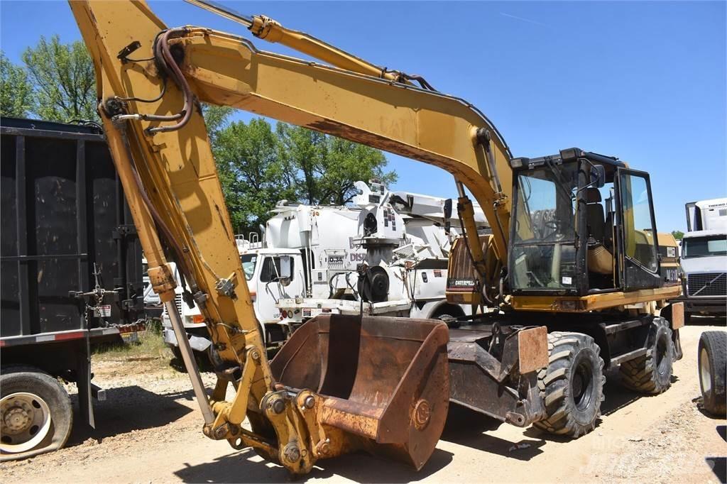 CAT M318 Wielgraafmachines