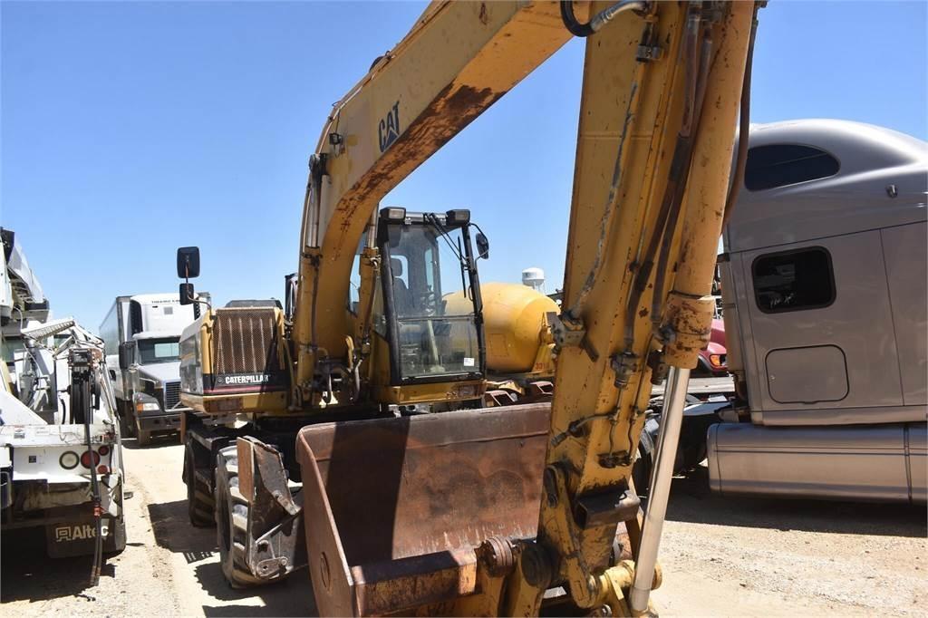 CAT M318 Wielgraafmachines